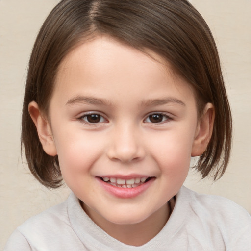 Joyful white child female with medium  brown hair and brown eyes