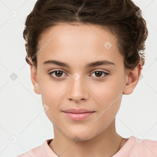 Joyful white child female with short  brown hair and brown eyes