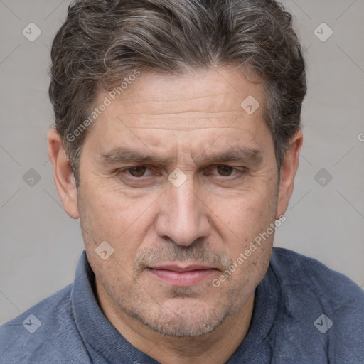 Joyful white middle-aged male with short  brown hair and brown eyes