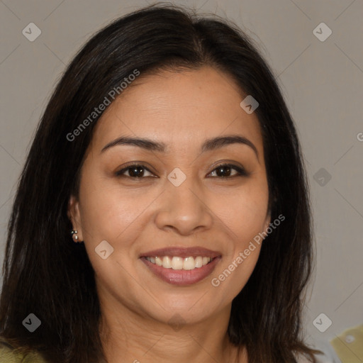 Joyful white young-adult female with long  brown hair and brown eyes