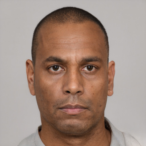Neutral black adult male with short  brown hair and brown eyes