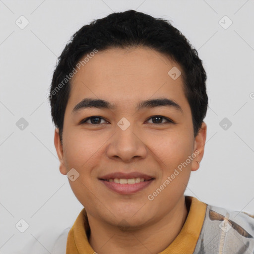 Joyful asian young-adult male with short  black hair and brown eyes