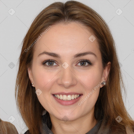 Joyful white young-adult female with long  brown hair and brown eyes