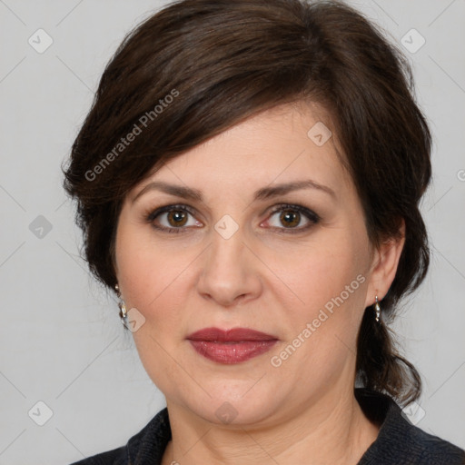 Joyful white adult female with medium  brown hair and brown eyes