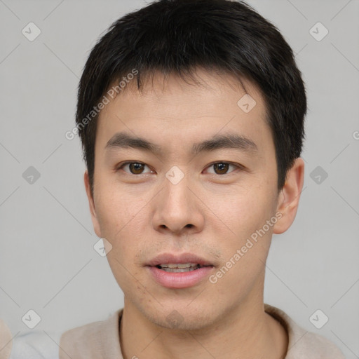 Neutral asian young-adult male with short  brown hair and brown eyes