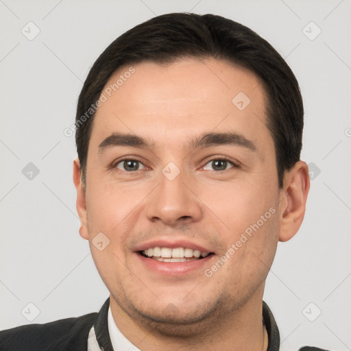 Joyful white young-adult male with short  brown hair and brown eyes