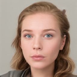 Neutral white young-adult female with long  brown hair and blue eyes