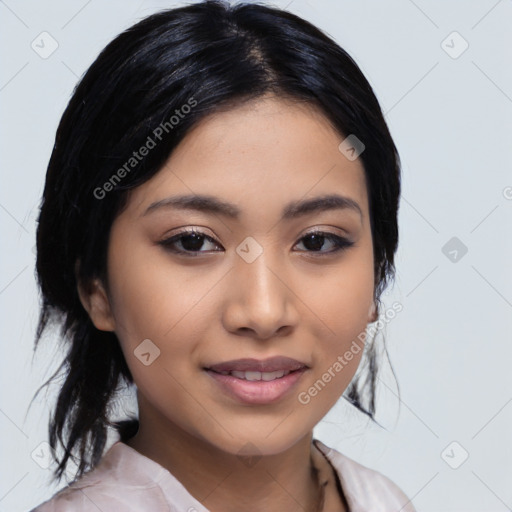 Joyful latino young-adult female with medium  black hair and brown eyes