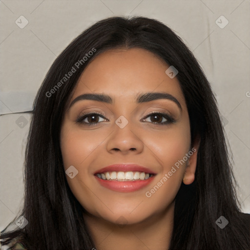 Joyful latino young-adult female with long  black hair and brown eyes