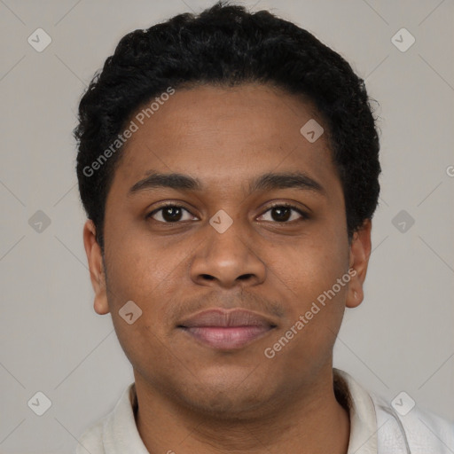 Joyful latino young-adult male with short  brown hair and brown eyes