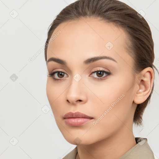 Neutral white young-adult female with medium  brown hair and brown eyes