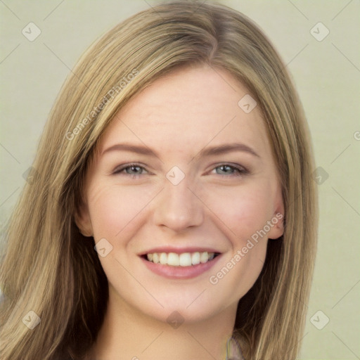 Joyful white young-adult female with long  brown hair and grey eyes