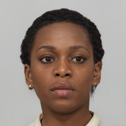 Neutral black young-adult female with short  brown hair and brown eyes