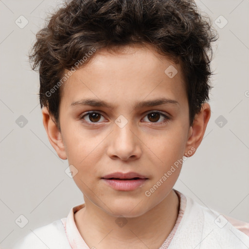 Joyful white child male with short  brown hair and brown eyes