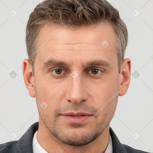 Neutral white adult male with short  brown hair and brown eyes