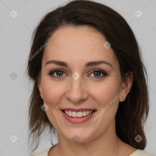 Joyful white young-adult female with medium  brown hair and brown eyes