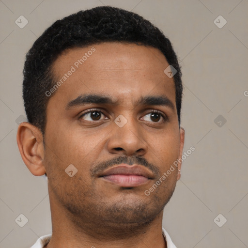 Neutral latino young-adult male with short  brown hair and brown eyes