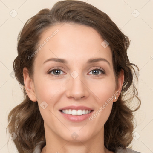 Joyful white young-adult female with medium  brown hair and green eyes