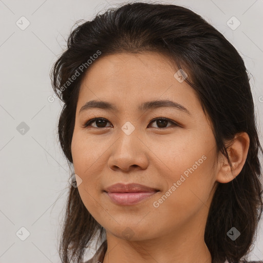 Joyful asian young-adult female with medium  brown hair and brown eyes