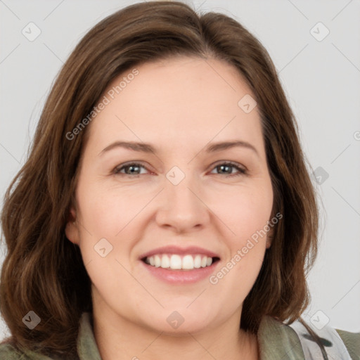 Joyful white young-adult female with medium  brown hair and green eyes