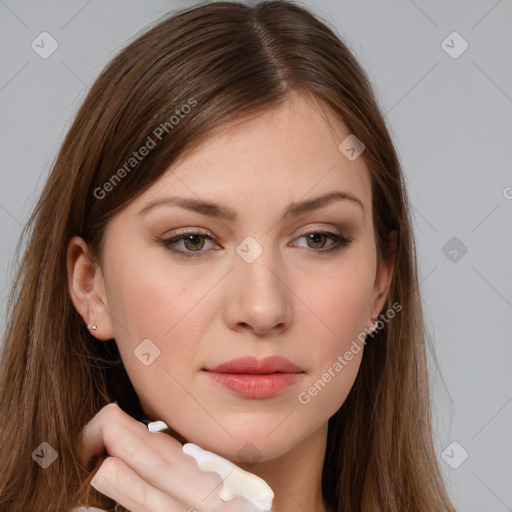 Joyful white young-adult female with long  brown hair and brown eyes