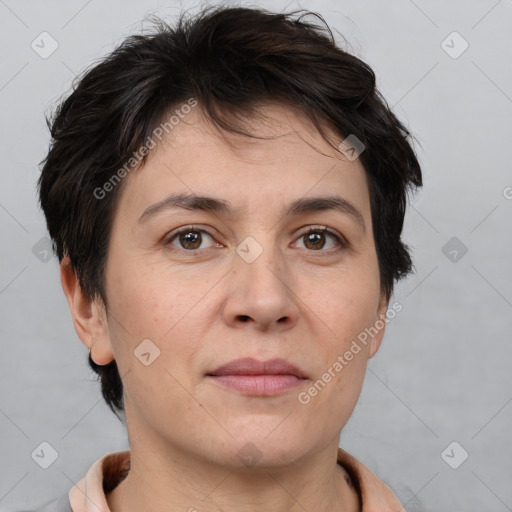 Joyful white adult female with medium  brown hair and brown eyes