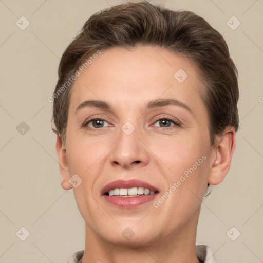 Joyful white young-adult female with short  brown hair and grey eyes