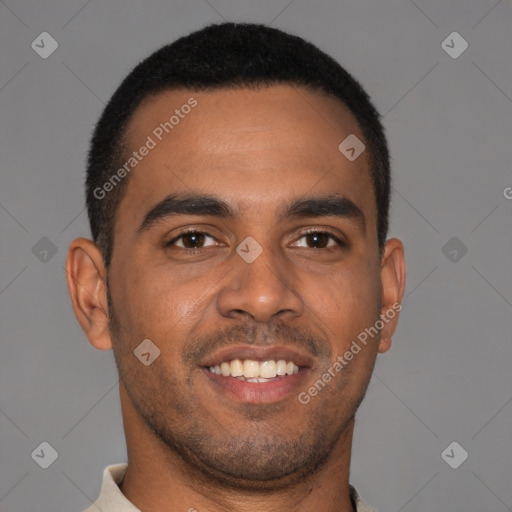 Joyful black young-adult male with short  brown hair and brown eyes