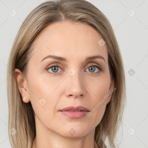 Joyful white adult female with long  brown hair and grey eyes