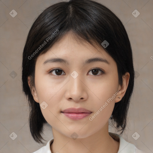 Joyful asian young-adult female with medium  black hair and brown eyes