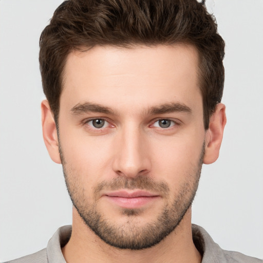 Neutral white young-adult male with short  brown hair and brown eyes