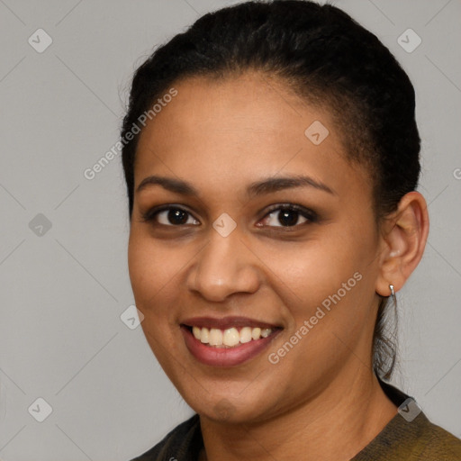 Joyful latino young-adult female with short  brown hair and brown eyes