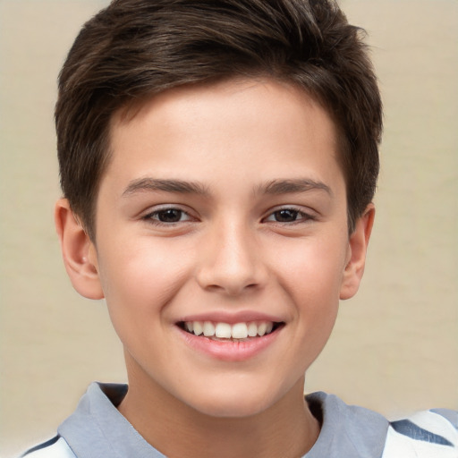 Joyful white child male with short  brown hair and brown eyes