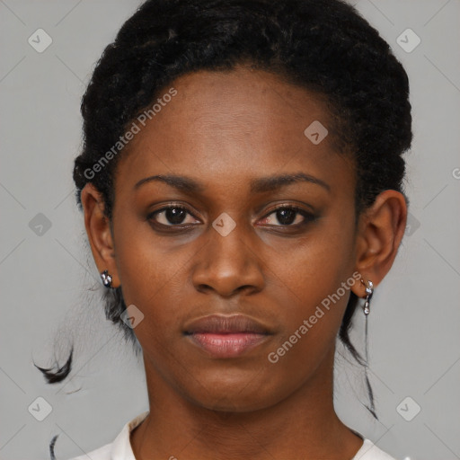 Neutral black young-adult female with medium  black hair and brown eyes