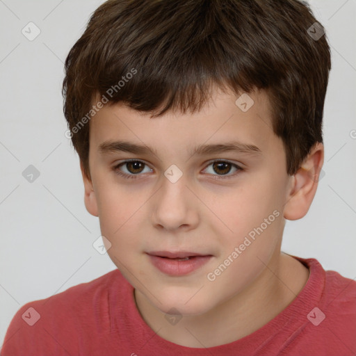 Joyful white child male with short  brown hair and brown eyes