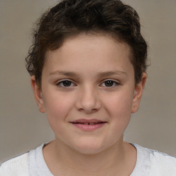 Joyful white child female with short  brown hair and brown eyes