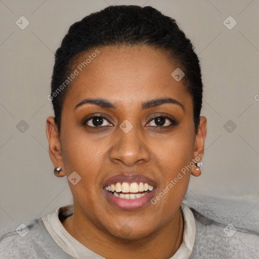 Joyful black young-adult female with short  black hair and brown eyes