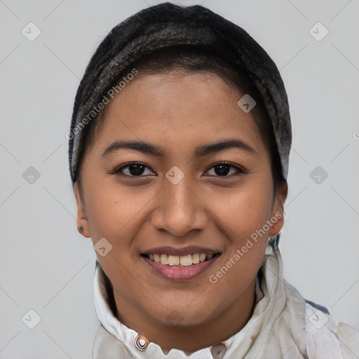 Joyful latino young-adult female with short  brown hair and brown eyes