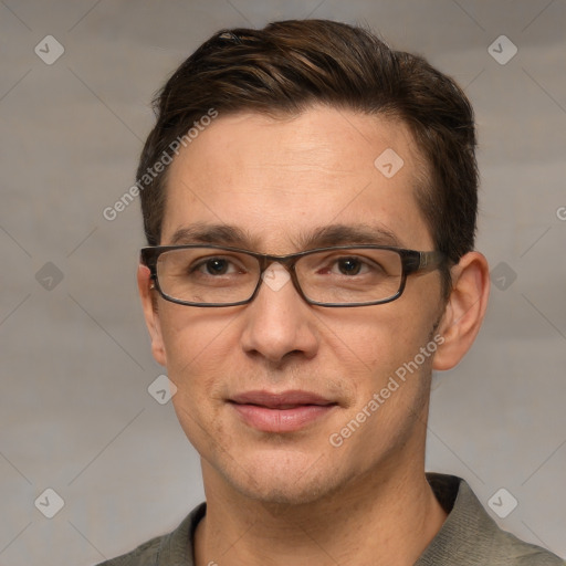 Joyful white adult male with short  brown hair and grey eyes