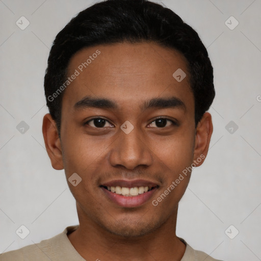 Joyful latino young-adult male with short  black hair and brown eyes