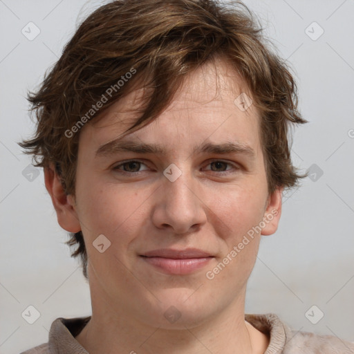 Joyful white adult male with short  brown hair and grey eyes