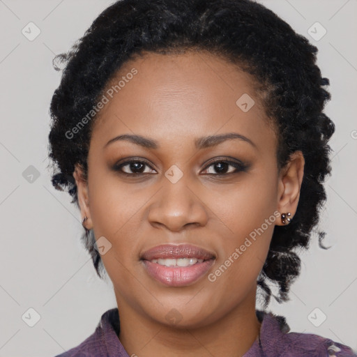 Joyful black young-adult female with medium  black hair and brown eyes