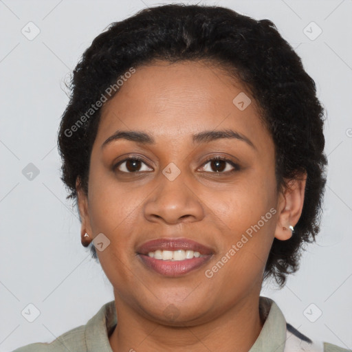 Joyful latino adult female with short  brown hair and brown eyes