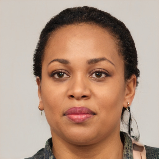 Neutral latino young-adult female with short  black hair and brown eyes