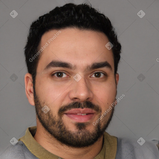 Joyful white young-adult male with short  black hair and brown eyes