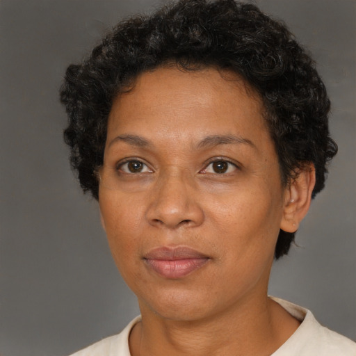 Neutral black adult female with short  brown hair and brown eyes