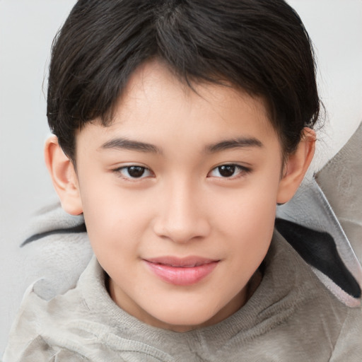 Joyful asian child female with medium  brown hair and brown eyes