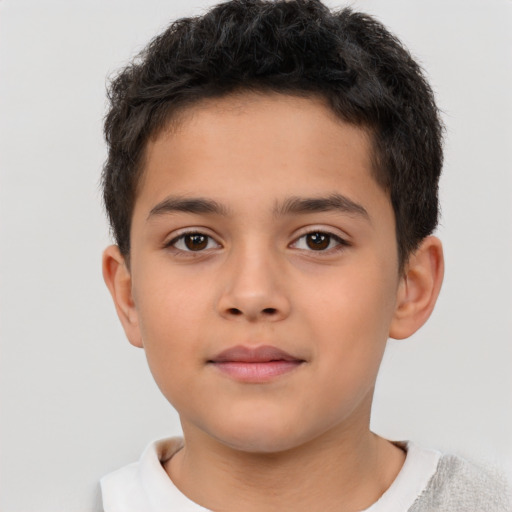 Neutral latino child male with short  brown hair and brown eyes