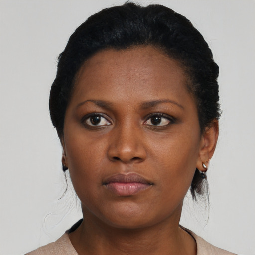 Neutral black young-adult female with short  black hair and brown eyes