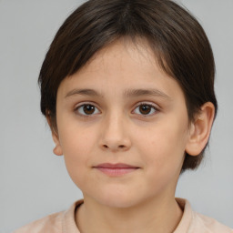 Joyful white child female with medium  brown hair and brown eyes